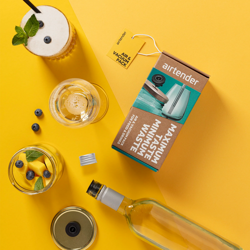 Airtender Air & Vacuum Gift Box on a yellow background with drinks and a cocktail.